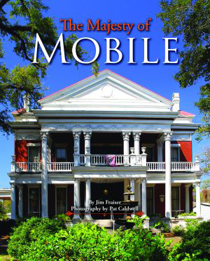 Cover image for The Majesty of Mobile showing a grand white southern mansion with columns and a wraparound porch.